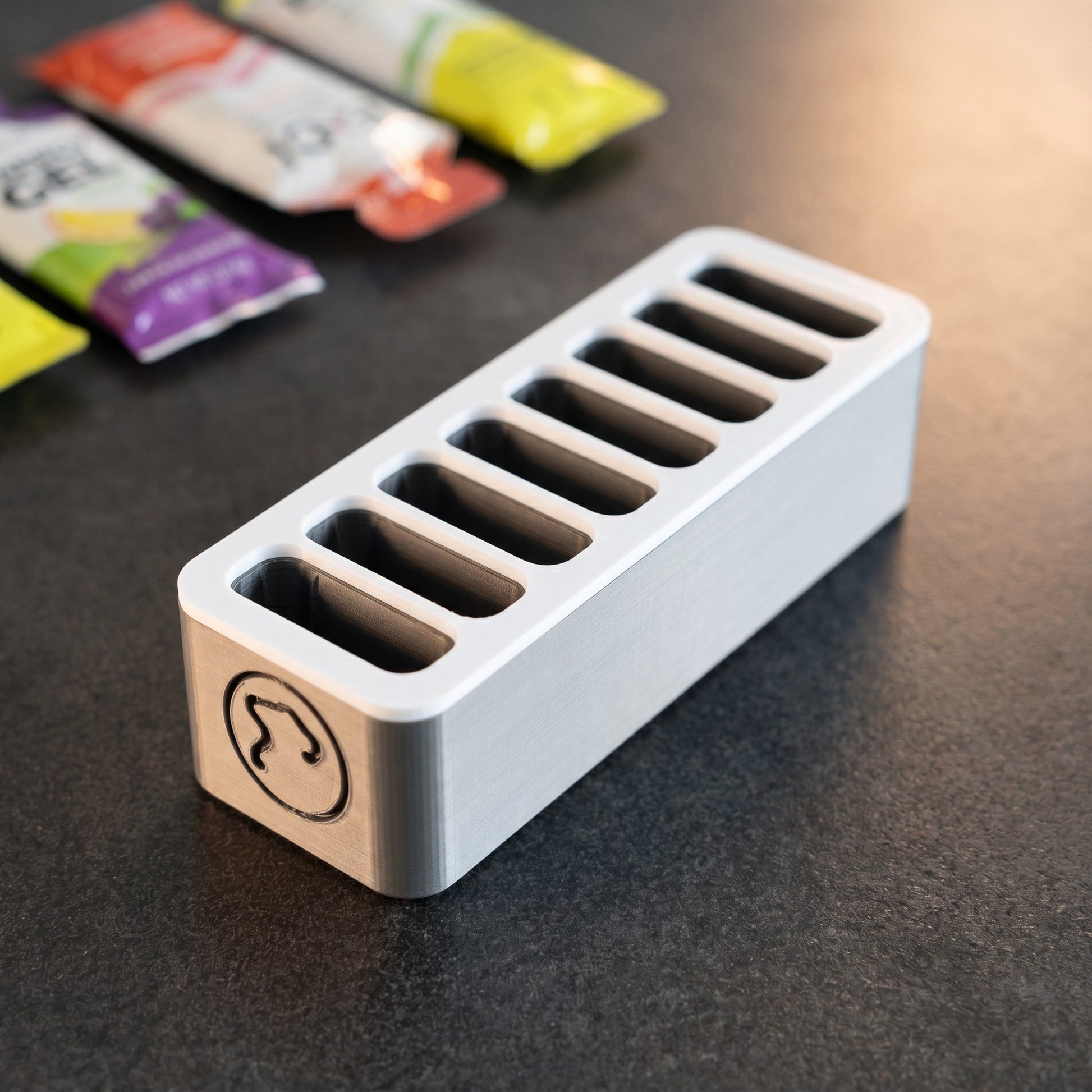Norello Fuel Rack in Grau mit weißem Deckel und 8 Slots